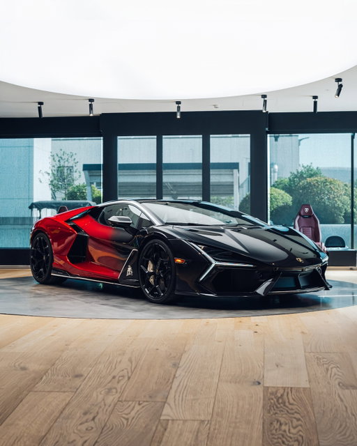 The V12 ignites emotions. #AdPersonam makes them unforgettable. 

A diagonal fading from Nero Pegaso to Rosso Efesto, framed by Bianco Monocerus pinstripes and the unmistakable bull on the door fin.

Inside, Bianco Leda and Nero Ade leather are enriched by Rosso Efesto stitching, bespoke Ad Personam trim, and the fading Revuelto silhouette on the rear wall. 

#Lamborghini #Revuelto #FromNowOn
_
Revuelto (WLTP): Energy consumption (weighted combined): 4,7 kWh/100 km plus 15 l/100km; CO2 emissions (weighted combined): 350 g/km; CO2 class (weighted combined): G; CO2 class with discharged battery: G; Fuel consumption with discharged battery (combined): 17,9 l/100km