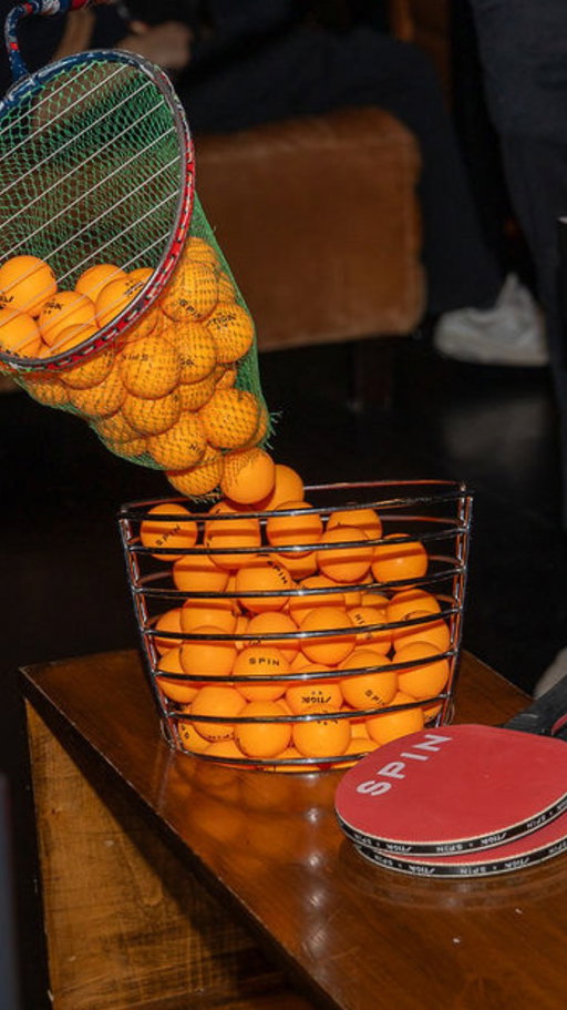 Chasing a ping pong ball across the room? 🟠⁠
⁠
Thankfully, at SPIN, we have team members for that.⁠
⁠
You focus on the game. We’ll handle picking up the balls and refilling your bucket.