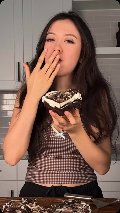 brownie oreo cheesecake bars
brownie:
2 eggs
1/2 cup (42g) cocoa powder
1/2 tsp (3g) salt
1/2 tsp (2g) baking powder
1 1/2 tsp (6g) vanilla
1/2 cup (113g) unsalted butter
1 cup (200g) sugar
3/4 cup (95g) flour
1/2 cup (60g) crushed oreos
*cream butter and sugar, then microwave gradually until sugar dissolves and is shiny. set aside to cool a bit. in a separate bowl mix eggs, cocoa, salt, baking powder, and vanilla. combine the egg and butter mixtures well, then add flour and oreos. pour into pan (I used 9x9) and bake at 350 for 27-30 minutes. take out of oven and carefully layer on whole oreos. set aside to cool.

cheesecake layer:
12oz cream cheese, softened
1/2 cup (100g) sugar
1 tsp (4g) vanilla
1/4 cup (60g) sour cream or greek yogurt
pinch of salt
1 cup (240g) heavy cream, cold
+layer of oreo cookies
*cream together cream cheese and sugar. then add in greek yogurt, vanilla, and mix until smooth. pour overtop of the baked brownie with cookies on top. chill in fridge 6hrs or overnight. optional: after chilling, pour on melted chocolate and crushed oreo pieces. #brownie #oreo #cheesecake #recipe