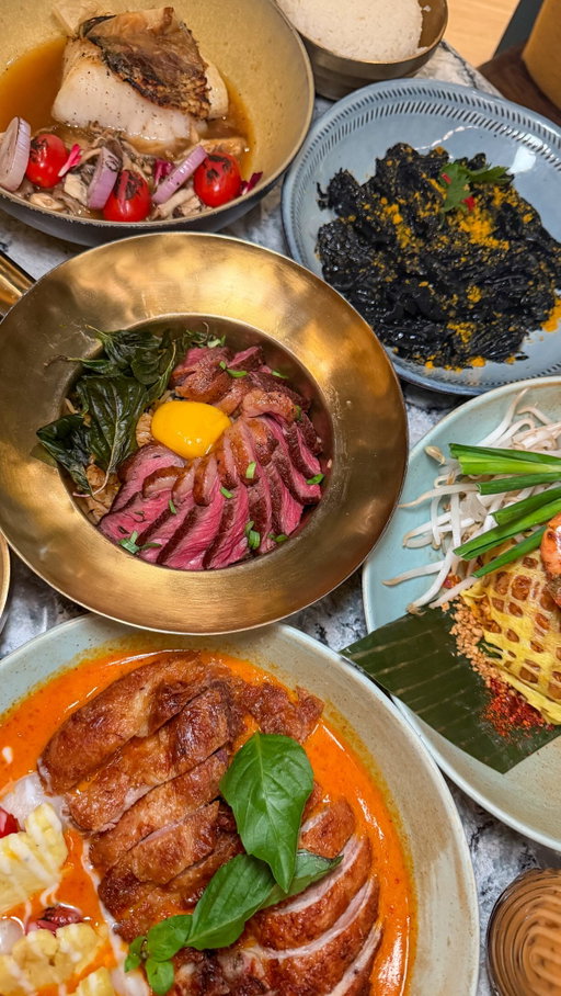 Thai Pavilion has some of the best modern Thai food in manhattan! Every dish was so good, but my favorites were the crispy half duck breast in red curry sauce and the seared picanha over fragrant rice with a cured egg yolk. Bonus points for the squid smothered in squid ink sauce and salted egg yolk, plus the Shrimp Coconut Panipuri, dishes you don’t usually find at Thai restaurants.

It’s also just steps away from Central Park and Fifth Avenue, making it the perfect spot before or after a walk around the city.
#nycfood #nycrestaurant #nycthaifood #eatingnewyork