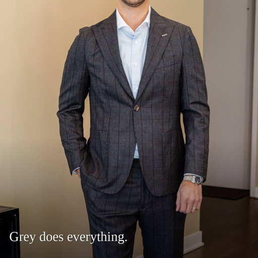 If navy is your first suit, grey is your second. A touch softer, works with every shirt and tie, and looks just as good with an open collar. Endlessly versatile. Level it up with grey plaid 👊
