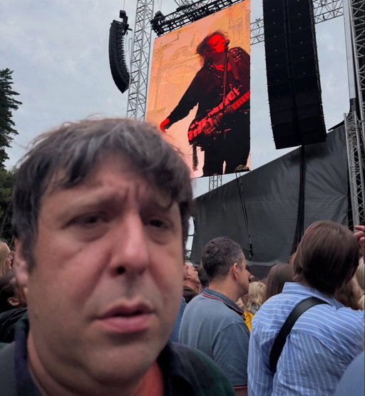 I had the great pleasure of discovering a band called @thecure in concert in the European nation of Lithuania. They are a very interesting band that I can appreciate as their lead singer appeared to be an obese alcoholic much like myself. The music they performed was decidedly sad and melancholic. While they did not touch on topics of obesity, alcoholism or excessive food consumption in their lyrics I felt the tone expressed these themes sub-textually and I greatly enjoyed my experience. Alcohol was very reasonably priced and I was deeply sloshed as I watched these withered elderly men perform their hits. I am physiologically incapable of smiling or laughing but if I was able to I would have smiled fleetingly during this performance.