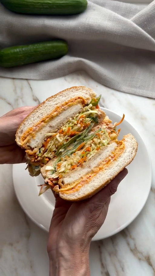 Kicking off my August Coles Simply recipe series with this Korean-style crumbed chicken burger… that’s also featured on the cover of this month’s Coles Magazine! 🍔
 
Simple ingredients, big flavour, and proof that affordable meals can still feel a little special. 
 
Recipe below or check out the August issue of the Coles Magazine in store at the checkout or online. 

*Makes 4 

4 Coles Simply RSPCA Chicken Burgers Plain Crumb
4 Coles Simply Hamburger Rolls, split
⅔ cup (200g) Kewpie Mayonnaise
½ cup (125g) kimchi, drained, chopped
1 Lebanese cucumber, cut into ribbons
4 Slices burger cheese 
Slaw
1 tbs rice wine vinegar
1 tbs soy sauce
2 tsp honey
2 cups shredded green cabbage
½ carrot, cut into matchsticks
2 spring onions, thinly sliced
½ green apple, cut into matchsticks
1 tbs white sesame seeds, toasted
 
1. Cook the chicken Preheat oven to 200°C (180°C fan-forced). Line a baking tray with baking paper. Place the chicken burgers on the lined tray. Bake for 12 mins or until golden and cooked through.
2. Toast the rolls Meanwhile, place roll tops and bases, cut-side up, on a baking tray. Bake for 3-4 mins or until toasted.
3. Prep the mayo Combine the mayonnaise and kimchi in a small bowl.
4. Make the slaw Combine the vinegar, soy and honey in a large bowl. Add the cabbage, carrot, spring onion, apple and sesame seeds and toss to combine.
5. Bring it all together & serve Spread the mayonnaise mixture over the cut side of each roll base, then top with cucumber ribbons, chicken burgers, cheese and slaw. Top with the bun tops and serve.
 
@colessupermarkets #ad #colessimply #chickenburger #easydinnerideas