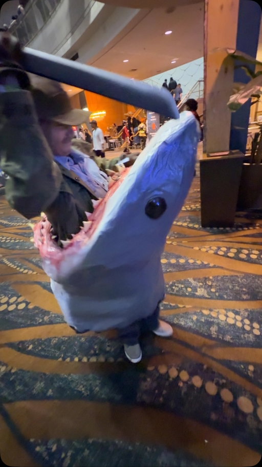 This Jaws-inspired costume is such a ridiculously fun way to celebrate one of the greatest movie monsters of all time at Midsummer Scream. The shark, the bite, and the Quint-inspired look popping out of the top — perfect. 

#Jaws #JawsMovie #JawsCosplay #Cosplay #MidsummerScream