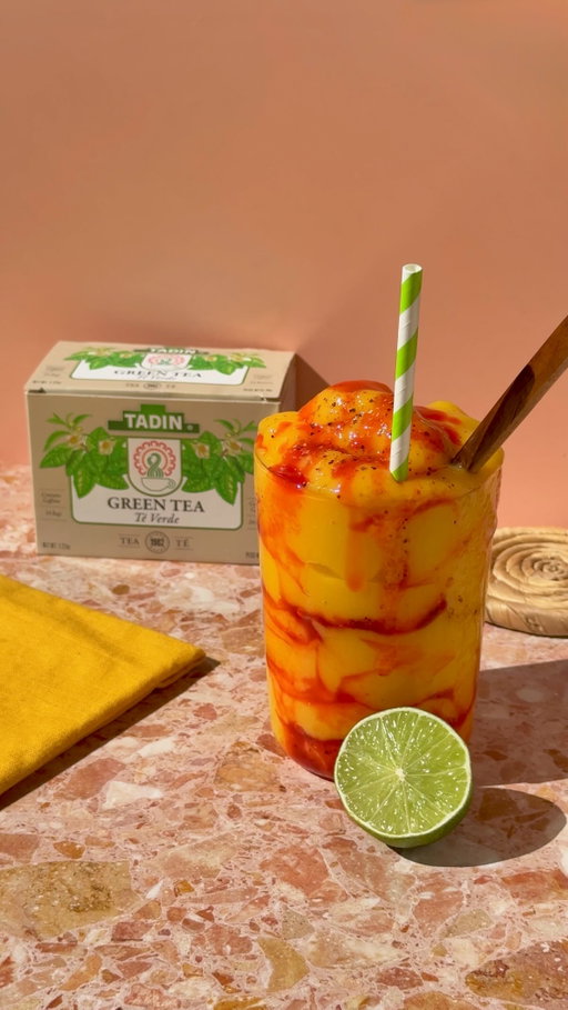 Nothing says summer quite like a mangonada🥭

We gave this beloved street treat a refreshing Tadin twist by blending Organic Tadin Green Tea with frozen mango, then topping it with chamoy, Tajín, and juicy mango chunks. A little sweet, a little spicy, and full of the flavors so many of us grew up loving. 💚

Ingredients – 1 serving
1 Tadin Green Tea bag
2 oz (60 ml) hot water
2 cups frozen mangoes
1 oz (30 ml) lime juice
Chamoy and tajin, for garnish

Start by combining your Tadin Green Tea bag and hot water and let it steep for 2-3 minutes. Next, add your frozen mangoes, lime juice, and green tea to your blender and blend until smooth. To assemble, line your glass with chamoy and tajin and add in half of your blended mangoes. Layer some more chamoy and tajin and then add in the rest of your blended mangoes. Top with some extra chamoy and tajin and enjoy!

Who would you share this with?

-

#tealover #tea #summerdrinks #refreshing tearecipe