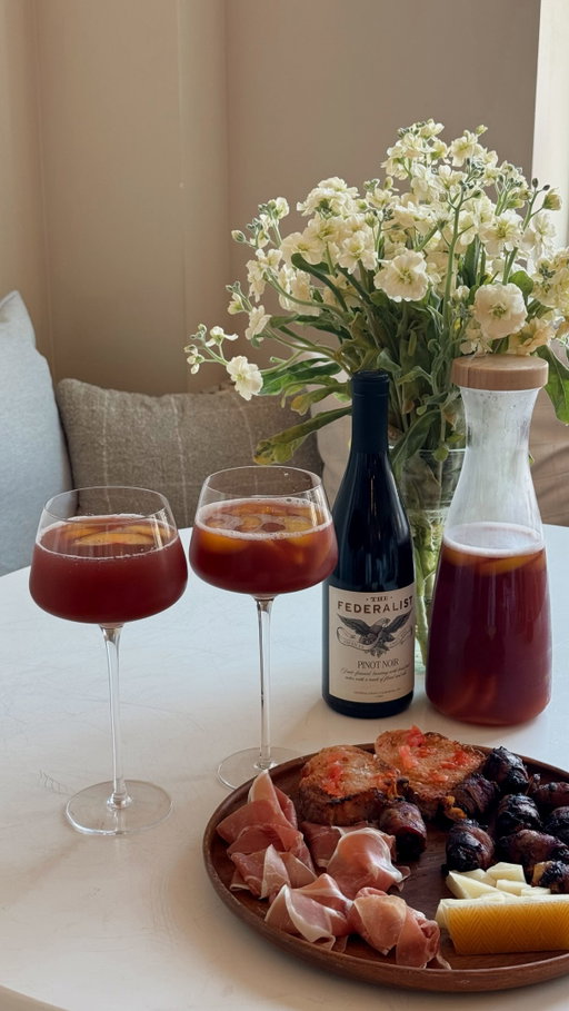 #Ad21+ my favorite happy hour combo to date ft. @thefederalistwines Pinot Noir 🌞🍷🍑

My mom’s speedy sangria recipe: 
1 bottle of The Federalist Pinot Noir 
1 liter of ginger ale
1 cup of orange juice
1/4 cup of sugar
Add a handful of frozen peaches to the pitcher and to each glass when you’re serving 

Whether you’re planning an outdoor dinner party, happy hour, or spontaneous get-together, The Federalist Wines fits seamlessly into the occasion. Click the link in my stories to find The Federalist near you!

#SummerBoldlyRefined #DrinkResponsibly #TheFederalist