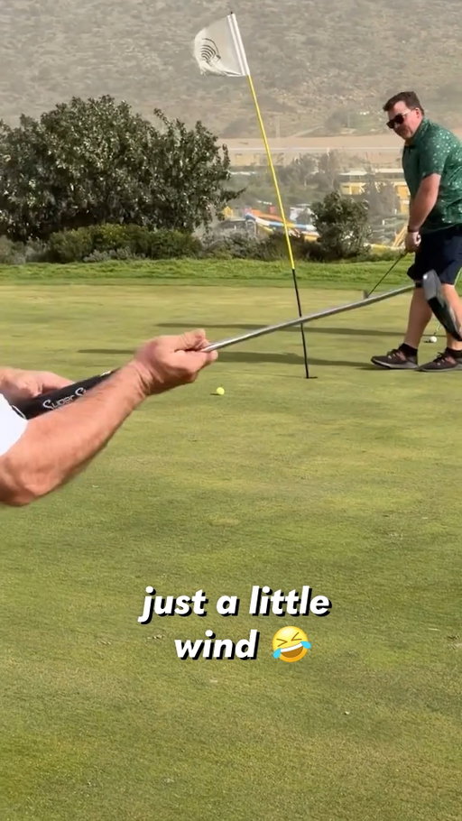 @crazycooter66 Heavy winds. Perfect shot. Didn't flinch. 
#PeopleAreAwesome #Golf #TrickShot