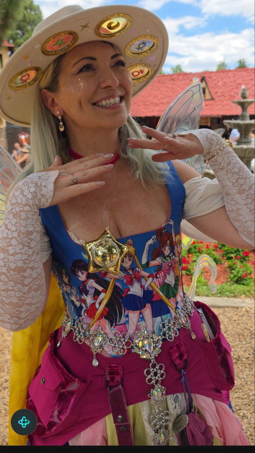 It's the Sailor Moon Ren Faerie! This is my custom curated and designed Sailor Moon Renaissance Dress! All pieces are made by artisans except the Sailor Moon necklaces and the fan club bracelet. 

Shoes were custom painted by me! 

Makers are tagged!

Hat @sunnyfoxapothecary 
Corset @atasan_studio 
Wings @hellofaerie 
Belt @thearmouredfaerie 
Utility belt @bluemoonkatherine 
Skirts @bosswenchofficial 
Ring @sapphirestudiosdesign 
Silks @feathertreeshop
