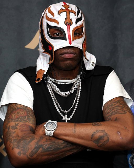 2 years ago today, Travis Scott was revealed as Rey Mysterio’s new tag team partner at Fanatics Fest NYC 👇

Rey hyped the crowd asking, “Are you guys ready for me to introduce my latest tag team partner?” before adding, “This man has shaped the landscape for hip-hop. He is an icon. He is also on ‘SICKO MODE.’ He is a rapper, producer, songwriter, and Grammy-nominated. Let’s give it up for the highest in the room, my newest tag team partner, Travis Scott!” 

Travis then emerged wearing one of Mysterio’s own luchador masks as “FE!N” played over the sound system, receiving a huge ovation from the crowd. Rey went on to present him with a WWE Houston Astros Legacy title belt, which Travis paraded around the convention

Travis also spent time signing autographs at the event, putting his signature on exclusive Topps Chrome Cosmic x Cactus Jack baseball cards he had personally designed alongside the brand Some of the signed boxes later resold on eBay for thousands of dollars. He was joined at the event by Michael Rubin and Michael Strahan

Looking back, this is another example of just how far Travis’s influence extends beyond music.