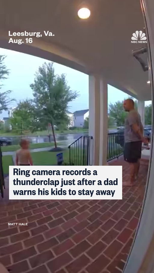 Ring camera records a thunderclap just after a father warns his kids to stay away.