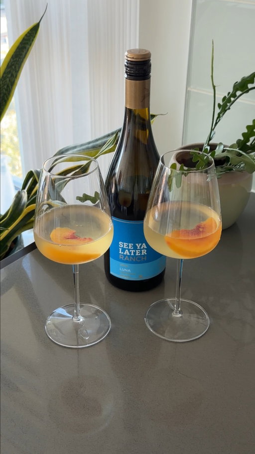 Frozen peaches in your Luna and yes, this is the summer content you came here for 🍑

Luna already smells like the Okanagan, think peaches and apple blossoms, so this pairing basically made itself. Find it exclusively at @BCLiquorStores.

BC wine, See Ya Later Ranch Winery, Luna wine, peach season, Okanagan summer #BCWine #Okanagan #SeeYaLaterRanch