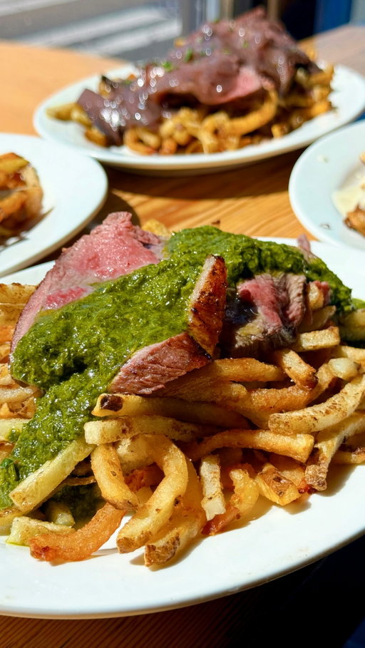 Steak Frites & Duck Breast Frites 📍Steak Easy⁣⁣ 🥩 
⁣⁣
JP and Boss recently opened up Steak Easy in Seattle, WA. For $15, you can get a plate of 4 oz sirloin cap steak with well seasoned fries and your sauce of choice. Upgrade to the 8 oz for $25 or try their duck breast frites for $25. Their chimichurri sauce was my favorite for the tangy acidity while Tommy loved the duck breast paired with the Sichuan sauce. I recommend getting a couple of the 4 oz plates to share so you can try the different sauces. Check them out inside @stumbletown_seattle !⁣
⁣
Thank you @steakeasy.bistro for having us! ⁣✨
⁣
#steakfrites #steakandfries #chimichurri #seattlewa
