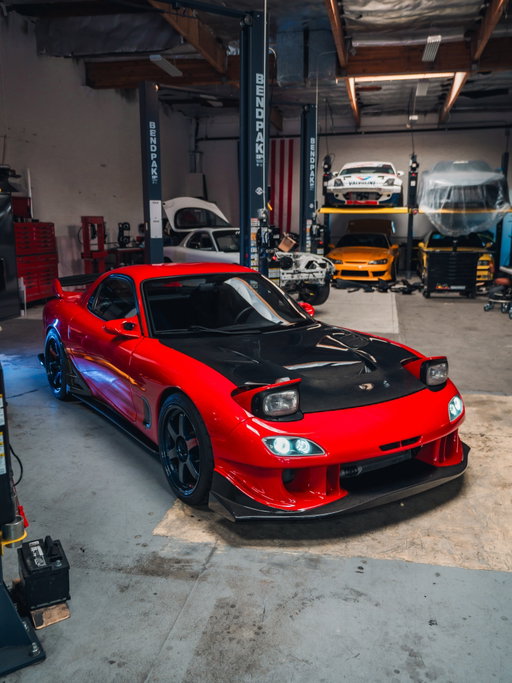 Red is the new BRG 😅 after a quick 5 weeks the “abandoned” RX7 R2 is back to life. Repainted in Mazda Vintage Red and 100% restored inside and out. The drivetrain came out of my White FD which has the PPRE 2 rotor and exterior parts. The interior from the R2 was nearly flawless and swapped a few pieces from my white FD. I still have a few pieces coming for this FD that I’ve been waiting for the right reason to purchase and I’m patiently waiting on their arrival 🙂 and after 10 years, I’ve finally converted back to the pop ups 😂 now here’s the part I’m unsure of. Does the MagBlue work on the red? Most would say no, but call me crazy I think it kinda works? I kinda love it? I’m not sure yet but until the clarity arrives they will stay until I find a replacement. Let me hear your thoughts!
