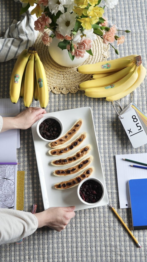 Nostalgia in design, simple in prep! ✨🍌#AD I’m sharing a fun twist on the classic school snack you might know as ants on a log. Just slice a @delmontefresh banana lengthwise, top with your favorite nut butter, and add your ‘ants’ (raisins or cranberries). Fast, fresh, fun, and delicious.” Find Del Monte® Bananas in your local grocery for your back-to-school or homeschool snack time! 📚🍌#FreshDelMonte