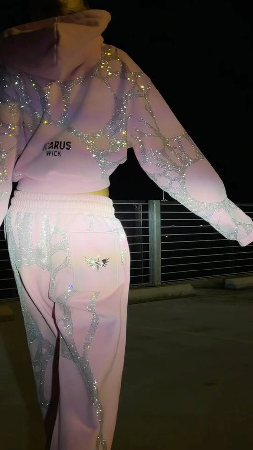 Your new favorite pink rhinestone sweatsuit 💎🩷

The perfect statement matching set: an oversized cropped hoodie, baggy sweatpants + all-over rhinestone detailing that catches the light with every move.

Available for pre-order now at Icaruswick.com 🪽

#fashioninspo #streetwear #matchingset #outfitideas #hoodie