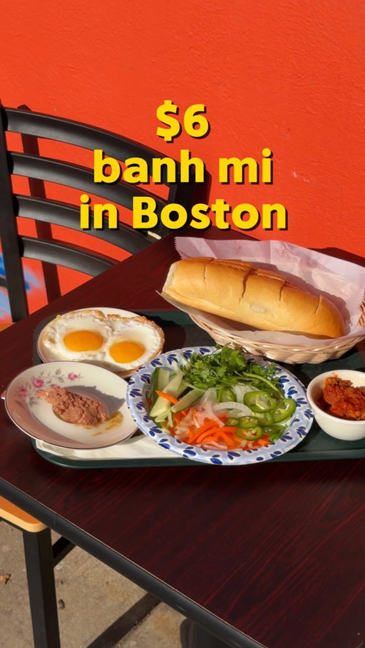 I almost couldn’t believe it when I saw the prices, but literally every banh mi is $6 (minus the roast pork one which is $7!!) BRING CASH

more filling and soupy dishes usually are at around $12 and it comes with fresh herbs! options vary everyday

“Goc Saigon” literally translates to “Corner of Saigon” which is exactly the type of vibe you get when you go here. even the art in front of the store is making me miss Vietnam 😭 there’s some outdoor seating but also seating inside that gives that cafe you’d run into during a morning in Saigon 

🥖 but the reason why this place really caught my eye is the $6 banh mi. yes, fully loaded with meat and veggies on a baguette. with the pate and Viet mayo and everything. my hot take is that I LOVE the vegetarian banh mi because of the tofu and marinated veggies in it. don’t knock it until you try it! add chilis!!!! 🌶️

and the coffee!!!! full disclosure you usually drink hot coffee through the phin (Vietnamese coffee filter), but we asked for ice on the side to pour the coffee into it after it cooled down (we just wanted to demo it!!)! so if you’re ordering an iced coffee, it’s not going to come with a coffee filter (but you can special request 🤭)

prices are soooo good, even my mom told them to increase their prices but the workers there don’t want to make it expensive for customers. so I will not be tolerating slander at this place!! you get exactly what you pay for so don’t expect anything out of this world or special, but food made with love that keeps the community in mind

I’ve already been at least a handful of times and my parents even more than that LOL so please show your support and give them a visit if you’re ever in the area!

📍Goc Saigon in Dorchester 

follow @viviandfoodie for more Vietnamese food recs around Boston✨

#boston #massachusetts #vietnamese #bostonfood #asianfood cheap eats in boston, dorchester food, vietnamese food in boston, banh mi in boston, asian owned business