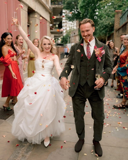 After (technically) two proposals, #HarryPotter actor @EvannaLynch and Denis Skinner exchanged vows this weekend at Wilton’s Music Hall. The bride’s first port of call when wedding planning? An astrologer. “Her thing was to avoid the solar eclipse,” Lynch tells #BritishVogue. They originally landed on 22 August because double digits are – to those in the know – angel numbers, spiritual checkpoints transmitted from the universe, but annoyingly, their venue was already booked on that day, so 21 August had to do. At the link in bio, Lynch shares all the details of her big day.

Photographed by @CamillaJoyPhotography.
