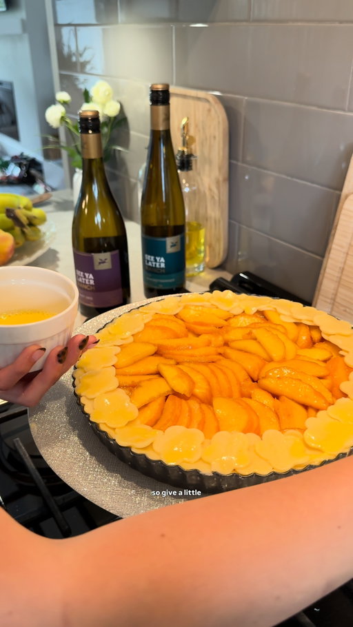 Wine maxxing episode two: the peach pie the whole series was leading up to 🥧

@cheffmylla blanched, sliced, and barely sweetened her way to the pie that actually lets the Gewürztraminer and Pinot Gris shine (turns out less sugar is the move when the wine's doing the heavy lifting).

Flower cutouts on the crust. Olive oil and salt and ice cream. A bottle of each already open.

Pie's done. Wine's poured. Just needs people to feed it to.

BC wine, See Ya Later Ranch Winery, wine pairing, Okanagan wine, Gewurztraminer #BCWine #Okanagan #SeeYaLaterRanch