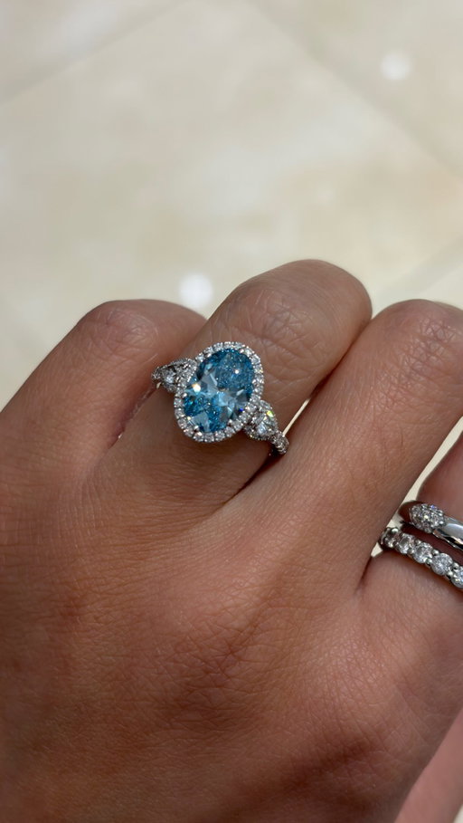 The kind of blue you never get over. 💙
Handcrafted in 18k white gold, featuring a breathtaking, vivid blue diamond framed by a delicate diamond halo and two pear-shaped diamond side stones. 
#JosephAnthonyInc #custommade #windsorontario #shoplocal
