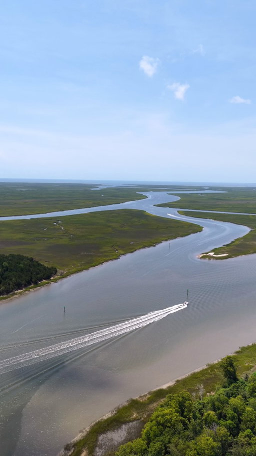This small South Carolina town is worth the drive. 🌴🌊

Just 38 miles north of Charleston, McClellanville feels a world away from the city. This little fishing village is surrounded by marshes, live oaks draped in Spanish moss, shrimp boats and some seriously good Lowcountry seafood.

Make a stop for lunch at T.W. Graham & Co., explore the historic streets, then head down toward the docks at Jeremy Creek to see the shrimping boats and get a feel for what makes McClellanville so unique. 🦐

It’s the kind of Charleston-area day trip that reminds you how much there is to explore beyond the city.