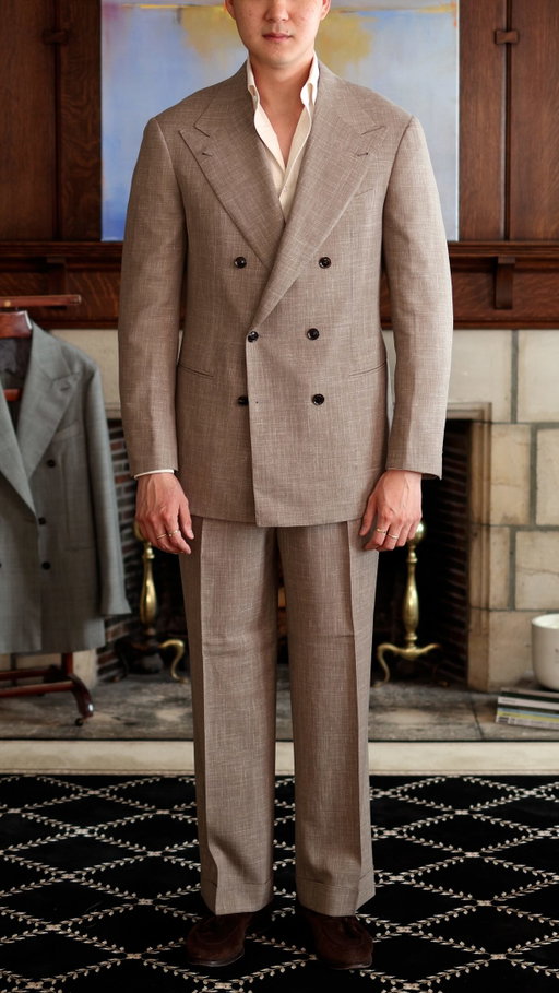 New @sartoria_raffaniello order just arrived and I genuinely cannot stop smiling. 

For those unfamiliar, Sartoria Raffaniello is headed by Noriyuki Higashi, an Osaka based tailor who trained under the legendary Antonio Pascariello in Naples. His work sits firmly in the Neapolitan tradition but with a distinctly Japanese precision and attention to detail. The shape and style of his DB jackets is so distinct and strongly appeals to my taste preferences.

There are three pieces in this one:
1. A Loro Piana Summertime suit in taupe, a wool-silk-linen blend that has been on my commission moodboard for a long time. Everything about this suit turned out perfectly and it will be getting its own dedicated video very soon.
2. A charcoal double breasted jacket in VBC 4-Ply. I had the fabric from when I made the trousers, so I decided to make this into a jacket to complete the suit.
3. A washed denim DB jacket that is uncanvassed, MOP buttons and patch pockets. Higashi-San has a RTW collection with very cool and interesting fabrics (like this denim and even a camo). The fabrics are also available via his MTM program.

Let me know which piece from this order is your favourite!