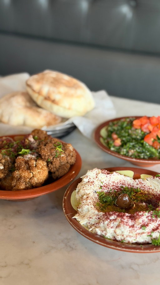 Mezze believe this spread was worth it. 😍

We ordered the “Mixed Grill for Two-Three” and it was the perfect way to sample a little bit of everything. It comes with your choice of three sides/appetizers, a variety of grilled meats, rice, and grilled veggies, so you really get a full taste of the menu.

For our three, we picked the babaghanouge, tabouleh, and cauliflower and honestly, the combo was SO good. I’d order the grill again just to keep working my way through the rest of the sides.

The pita deserves its own mention too: fresh, warm, and piping hot when it hit the table. 🫓

Service was wonderful from start to finish - kind, attentive, and prompt.

With a few locations to choose from, definitely add this one to your list!

#seattlerecommendations #seattlerestaurants #lebanesefood #seattlefoodie #seattlefoodies