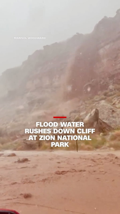 Video shows water rushing down a cliff at Zion National Park in Utah on Monday after heavy rains triggered flash flooding.