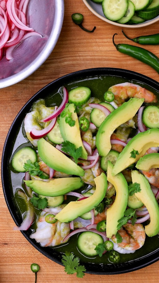 A spicy, ice-cold kinda summer #Cholulapartner #ad

Homemade seasoned chips with fresh shrimp aguachile, covered in lime, serrano, cucumber, lime-marinated red onion, and avocado. It’s fresh, spicy, and always hits the spot at any get-together. Pick up @cholulahotsauce Original Hot Sauce and Taco Seasoning and give this a try.

INGREDIENTS
(Serves 3–4)

AGUACHILE
+ 1 lb raw shrimp, peeled and cleaned
+ Juice of 8 large limes, divided
+ 2 serrano peppers, divided
+ 1/3 medium red onion, thinly sliced
+ 1 handful fresh cilantro
+ 1 handful fresh parsley
+ 2 Persian cucumbers, cut into rounds
+ 1 large avocado, sliced
+ 1–2 tsp Cholula Original Hot Sauce
+ Cholula Original Hot Sauce, for topping
+ Flaked sea salt to taste
+ Fresh cilantro leaves, for garnish

SEASONED CORN CHIPS
+ 2 TBSP Cholula Original Taco Seasoning
+ 2 C masa harina
+ 1.5 C warm water, plus more as needed
+ Neutral oil, for frying
+ Cholula Original Taco Seasoning, for finishing

DIRECTIONS

+ STEP 1: TORTILLAS
Mix masa harina and Taco Seasoning. Gradually add warm water until a soft dough forms. Divide and press into about 20, 5–6 inch tortillas. Cook on a hot comal 30 seconds on the first side, flip and repeat 2 more times, cooking longer than normal until dry and stiff. Cool, then cut into thirds.

+ STEP 2: CHIPS
Heat oil to 350°F. Fry tortillas until crisp and lightly golden. Transfer to a wire rack and immediately sprinkle with Taco Seasoning.

+ STEP 3: PREP
Thinly slice onion, cut cucumbers into rounds, slice avocado and butterfly shrimp. Halve 1 serrano for the aguachile and thinly slice the other for topping.

+ STEP 4: MARINATE
Season shrimp with flaked sea salt and juice of 7 limes. Refrigerate 4–5 minutes, then drain, save juice and keep shrimp cold. Separately, toss onion with juice of the remaining lime.

+ STEP 5: AGUACHILE
Blend saved lime juice with serrano, cilantro, parsley and 1–2 tsp Cholula Original Hot Sauce until smooth, adding water as needed.

+ STEP 6: SERVE
Arrange shrimp and pour aguachile over top. Add cucumber, onion, avocado, sliced serrano and cilantro. Finish with flaked sea salt and Cholula Original Hot Sauce.