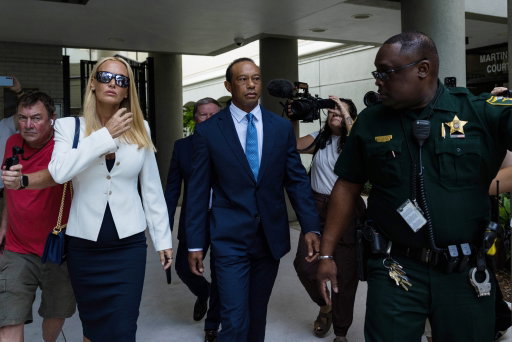 Tiger Woods' girlfriend Vanessa Trump supported him in court today, where he entered a guilty plea for a lesser charge of reckless driving and refusal to submit to a lawful test.

His license has been suspended for 5 years after his DUI arrest earlier this year.

Photos: Getty Images
#TigerWoods 
#VanessaTrump