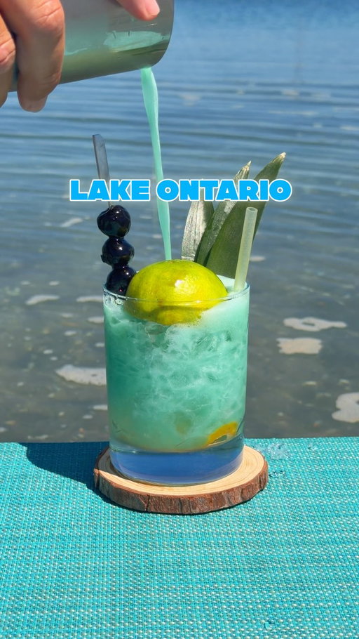 Lake Ontario 🇨🇦🥃💙
This cocktail is a nod to our friendly neighbors to the north. It’s a fun Rye whiskey variation on the Mai Tai. The spice of the rye really carries through in this tiki format with supporting flavors from nutty orgeat and maple syrup, all balanced out by tangy lime. 

Did you know the Ontario comes from an Iroquois word meaning shining waters? 

Cocktail recipe 
2oz 100 Proof Rye Whiskey 🇨🇦 
3/4oz Lime Juice 🍋‍🟩 
1/2oz Blue Curaçao 💙
1/4oz Orgeat 🍯
1/4oz Maple Syrup 🍁

#lakeontario #satire #maitai #cocktailrecipe #ryewhiskey
