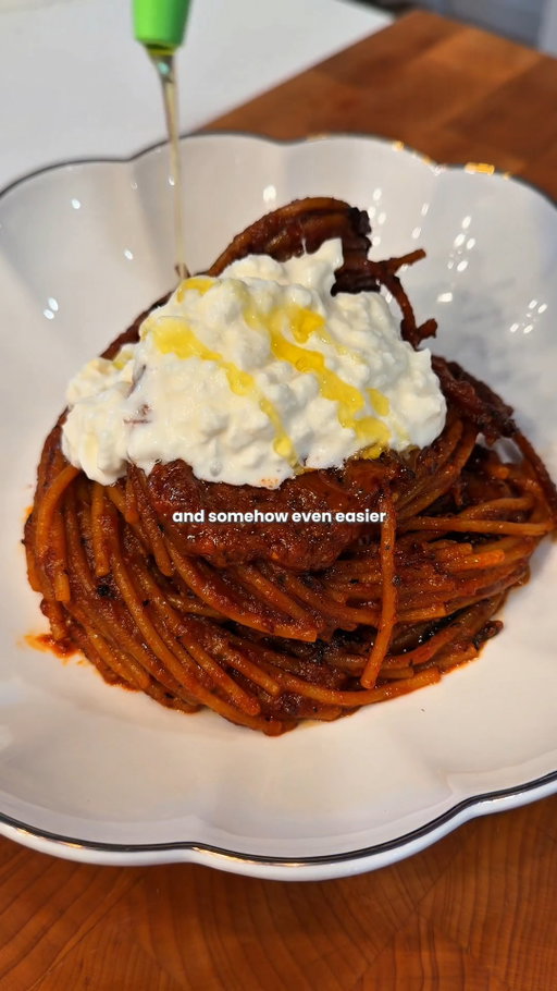 Comment PASTA for the recipe.

Spaghetti all’Assassina is a smoky Bari specialty where dry spaghetti cooks directly in rich tomato broth until tender underneath and deeply scorched and caramelized on the edges, then gets finished with creamy stracciatella, basil, and olive oil.