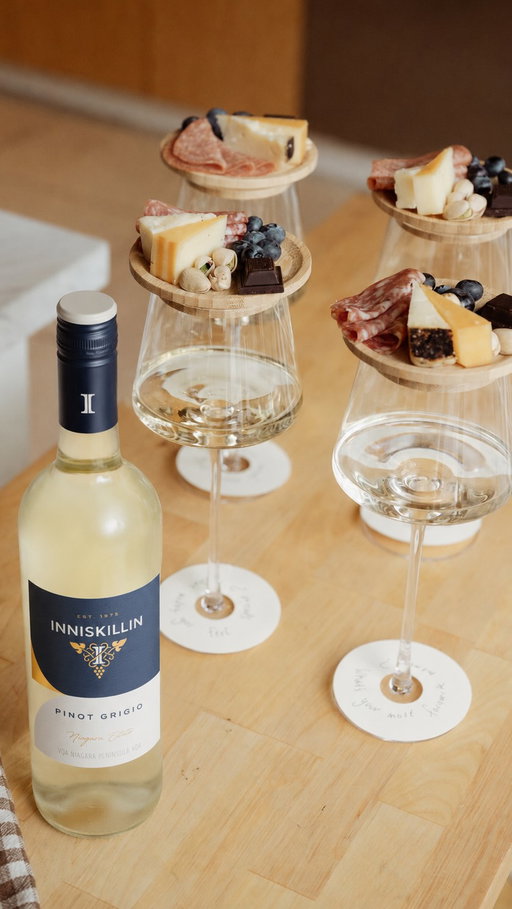 Some of the best pairings aren't just wine and cheese. They're the people around the table.

Personalized wine glass tags, individual charcuterie toppers, and a bottle of your favourite wine — the perfect combination that makes hosting feel a little more special.

Build your DIY charcuterie toppers and pair with our Niagara Estate Pinot Grigio, available through the link in our bio, at the LCBO, Wine Rack, and our estate.

#charcuteriecups #pinotgrigio #awardwinningwines #inniskillin #hostinghacks
