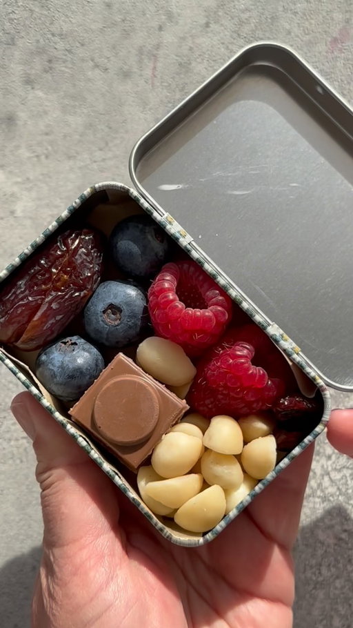Fill my snack tin with me. 🤎🤍💛

Loving the viral mini snack tin trend, so today I’m making my own little snack box with all my favourites.

Since it’s Australian Macadamia Nut Day of course @ausmacadamias had to be included.

What’s in my tin:
Dates
Blueberries
Raspberries
Australian macadamias @ausmacadamias 
Cranberries
Chocolate

The perfect mix of sweet, fruity, crunchy and chocolatey — basically everything I want in a snack.

What would you add to your snack tin?

Happy Australian Macadamia Nut Day. 🤎🤍💛
.
.
.
#macadamia #macadamianutday #snacktin #snackideas #snack