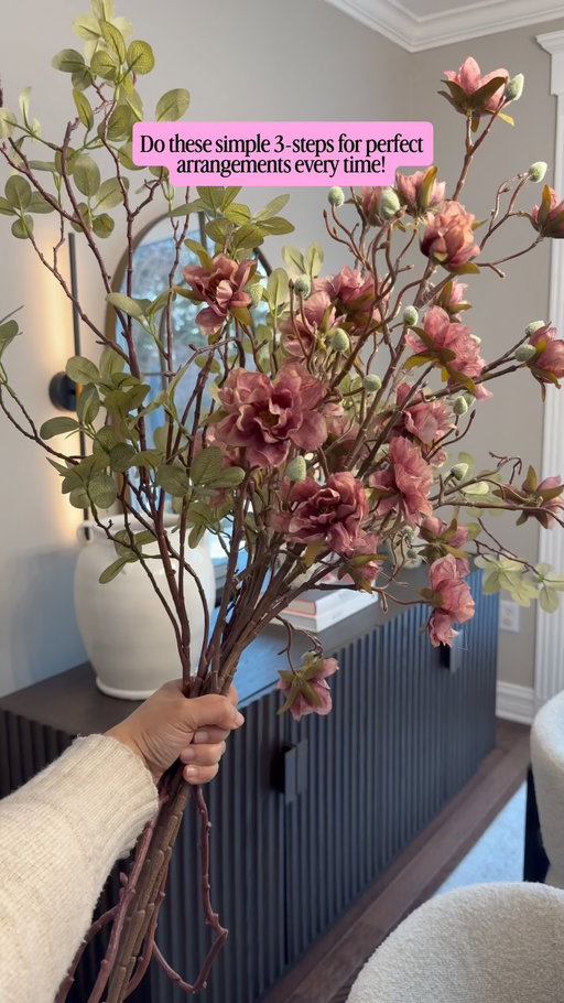 Boring floral arrangement? You don’t have to buy new florals ....maybe you are just styling your arrangements the boring way? Use this 3 step floral arrangement trick that will elevate any arrangement instantly!

Step1- 1. Build a Base with Simple Greenery
Start by establishing the structure and shape of your arrangement.
Step2-Add Florals for a “Pop” of Color - you can add any vibrant flowers can be same colors or different colors! You can style them high or low! This step will create visual interest and color
Step 3 - Add drama by using cascading steps. Just a little spill over the edge of the vase can do the trick!

C0MMENT: FLOWERS for all the 🔗 to these and many more bestseller florals!

Elevate flower arrangement
Home inspiration
Home hacks
Flower tips
Decor ideas
Amazon Home Finds