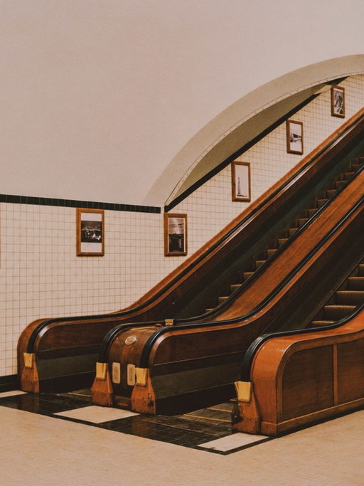 Wooden escalators at Saint Anna’s Pedestrian Tunnel, Antwerp. Designed by Emiel Van Averbeke…