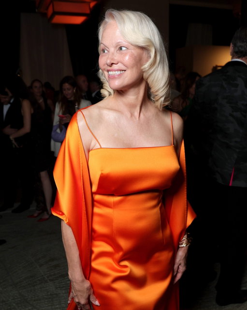 Yesterday evening, #PamelaAnderson stepped out at the amfAR Gala Venezia during the annual international film festival, wearing a vibrant orange Calvin Klein gown with a matching wrap. Keeping the rest of her look minimal, she opted for pared-back accessories and natural make-up.

See more of the best style from the Venice Film Festival so far at the link in bio.