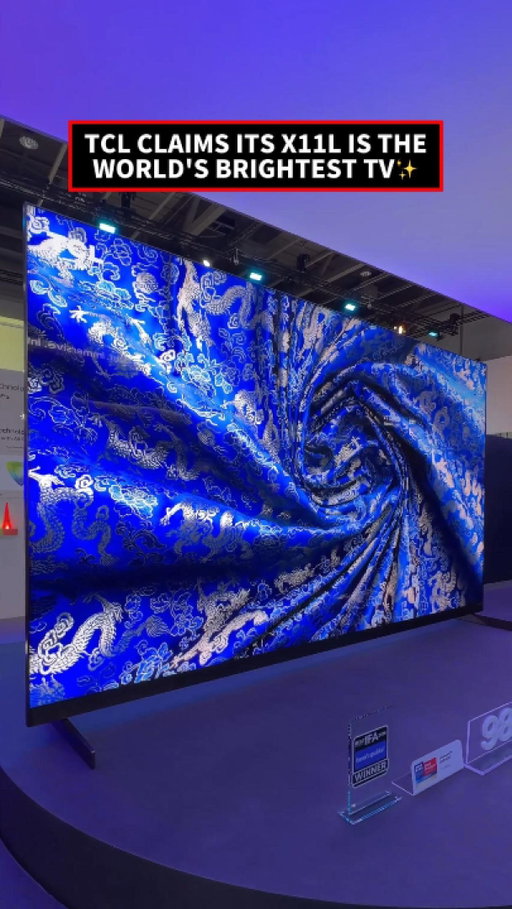 TCL showed off its ultra high-end 98-inch X11L SQD-Mini LED TV, claiming it as the world’s brightest TV. 🌎💡

This massive panel packs 20,736 local dimming zones, and according to TCL, reaches up to 10,000 nits peak HDR brightness with 100 percent BT.2020 color coverage. It also includes a TSR AiPQ processor and audio tuned by Bang & Olufsen. 🔊 

Available now for around $10,000. 💰

Made possible by Rode. #IFA2026 #TCL #AllAccess  #TV #HomeTheater

Social team travel provided by Roborock