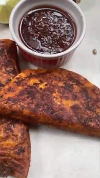 Worth the hype! These viral birria tacos made with the Stack & Snap™ Food Processor will have everyone talking (and reaching for seconds). 

Ingredients
Chilli Sauce/Marinade

2 guajillo chili stem and seeds removed
2 ancho chili stem and seeds removed
2 tsp chipotle in adobo sauce
1 1/2 cup beef broth 

Birria Stew

1 lb beef chuck roast or brisket
1 tsp salt 
1/2 tsp black pepper
1/2 red 
4-5 garlic cloves chopped
1 tsp vinegar
1/2 tsp ground cumin
1/4 tsp ground coriander
3/4 tsp salt adjust later
1/4 tsp Mexican oregano
1 bay leaf
1/2 cup beef broth

Directions
In your  Stack and Snap food processor or any food processor that you have, puree the chilli sauce/marinade ingredients till smooth. Set aside.
Next, slice the beef into 4-5 chunks and sprinkle liberally with salt and pepper. Sear the beef on a hot pan with a little bit of oil 3-4 mins on each side till it has developed some color.
I use my multicooker on "Sauté Mode" but use the pan in which you will be cooking your stew.
Once seared, remove the meat, and in the same pan, add the chopped onion and garlic and stir for a minute. Then, add vinegar. Instantly the brown bits of flavor left from searing the meat will lift up. Stir for a couple minutes.
Next, add the meat back into the pan along with the chilli marinade, the spices listed under Birria Stew (cumin, coriander, salt, oregano, bay leaf) and 1/2 cup of beef broth.
You can add a bit more broth enough till the meat is loose and almost submerged in the liquid.
Pressure cook with vent sealed on "High" for 55 mins at least and then check to see whether the meat is pull apart tender. I used chuck roast and it took me 1 hour 15 minutes but if you use a brisket or any other cut of meat, it will take you less time.
Shred the meat & set aside.
To assemble tacos, heat a non-stick skillet with a touch of oil. Next, dip a 6" tortilla into the stew (the fat from the stew will come on top so you're essentially be frying up the tacos in the stew fat).
Fry the taco on one side for a minute or two then flip. On the flipped side, layer on the meat, chopped onion and cheese. Fold the tortilla and let it crisp on both sides.

Video & recipe by: @rookiewithacookie