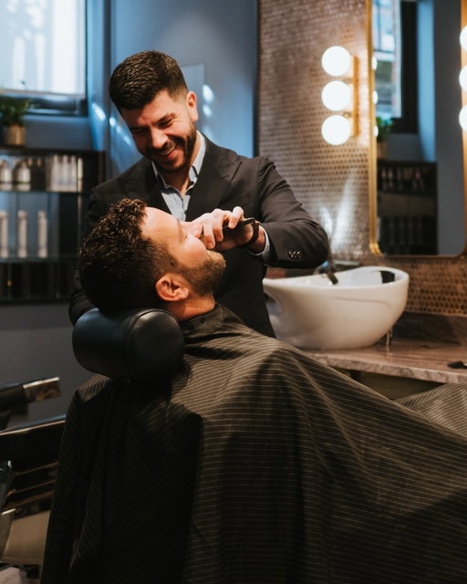 Freshly shaved and back to work, with the one and only @stefan_avanzato at @avanzato_grooming_lounge.  I’ve know Stefan since 2015, when @dolcegabbana approached me to launch their first ever barber shop on Bond Street. Stefan was the master barber, and we created the campaign together. From the moment on, nobody else has touched my hair or trimmed my beard. Over the years, we’ve been through pretty much every transformation imaginable: shaved, long, moustaches, goatees, clean shaves, beard maintenance, you name it, Stefan has delivered. From private home visits during the pandemic to countless photoshoots and events hairstylings, what started as a collaboration became a friendship, a brotherhood. Today, Stefan runs his own grooming salon, continuing to do what he does best. If you’re in London, treat yourself with an appointment. I’ve relied on his hands for over a decade.