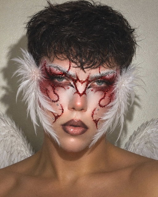 i can be your devil or ur angle 
face ˚₊‧꒰ა ☆ ໒꒱ ‧₊˚
@hauslabs s triclone skin tech foundation
@natashadenona hy-glam concealer
@patricktabeauty major sculpt crème contour
@rarebeauty soft pinch liquid blush
@hudabeauty easy bake loose baking & setting powder
@fentybeauty diamond bomb in how many carats?!

eyes 𐙚⋆°.
@blendbunnycosmetics ellis atlantis 45 shade palette
@halfmagicbeauty chromaddiction shimmer for the icy white/silver detailing
@nyxcosmetics epic ink liner in black
@kissnypro lashes 🪽

details ⋆✦₊˚
rhinestone design + placement inspo — @medovyi_max ❤️‍🔥
feather inspo + placement — @kissedby.kam 🪽
white feather pieces + red/silver rhinestones applied individually

brows ౨ৎ˚₊
@mehronmakeup paradise makeup aq in white
@maccosmetics the brow glue in transparent

lips ⋆౨ৎ˚⟡˖ ࣪
@makeupforever artist color pencil in endless cacao
@maccosmetics lipstick in myth
@fentybeauty gloss bomb in glass slipper

wings edited in using random angel wing pics from google because unfortunately i have not grown my own yet 🪽

rhinestone placement inspo @medovyi_max 
feather inspo + placement @kissedby.kam 🤍
