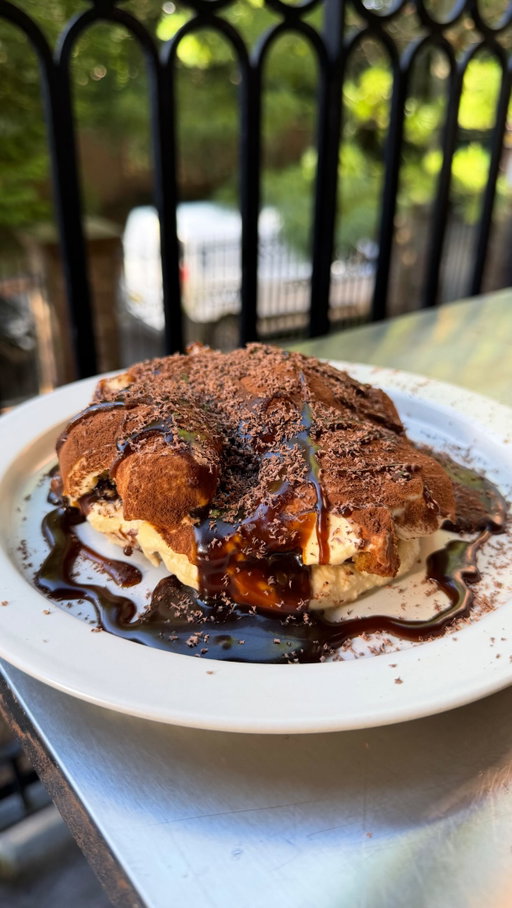 This is my Sticky Toffee Banana Bread Tiramisu - the best dessert I’ve ever made. 

Honestly… any banana bread recipe will do, as it’s getting doused in coffee and mascarpone!

Banana bread 150g unsalted butter, softened 180g light brown sugar 3 eggs 290g ripe banana, mashed 275g self-raising flour 150g dark chocolate, chopped
Mascarpone filling 500g mascarpone 50ml coffee liqueur 6 eggs, separated 120g caster sugar 300ml double cream

Sticky toffee sauce
150g butter
200g dark muscovado sugar
250ml double cream
1 tbsp black treacle
pinch of sea salt
 300ml strong coffee, cooled 60ml coffee liqueur Cocoa powder Dark chocolate

1. Start with your banana bread. Heat oven to 170°C fan. Beat the butter and sugar until pale and fluffy, then beat in the eggs one at a time. Fold through the mashed banana, flour and chocolate. Spoon into a lined rectangular tin and bake for around 30–35 mins until cooked through. Cool completely.
2. While it bakes, make the sticky toffee sauce. Add the cream, butter, sugar and black treacle to a pan and simmer for 3–4 mins until smooth and glossy. Add a good pinch of sea salt and leave to cool. 
3. Whip the mascarpone with the coffee liqueur until soft. Whisk the egg yolks with the sugar until pale and fluffy before folding through the mascarpone. Whisk the egg whites to soft peaks and gently fold through, followed by the softly whipped cream.
4. Mix the cooled coffee with the coffee liqueur.
5. Thinly slice the cooled banana bread and soak in the coffee mixture. Layer with mascarpone filling, sticky toffee sauce and a dusting of cocoa, then repeat.
6. Chill until set, then finish with shaved dark chocolate and plenty more sticky toffee sauce.

More in detailed breakdown on Substack soon!