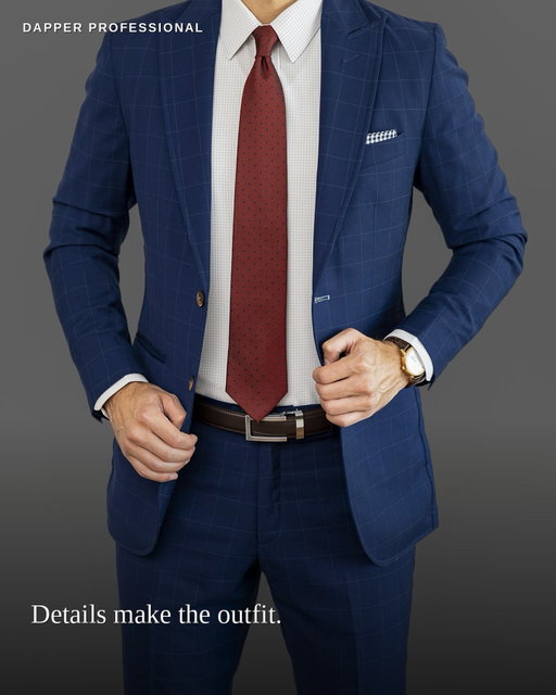 Details Make the Outfit

A simple tie sitting right at the belt, a matched leather belt, a clean watch. None of it is loud, and all of it matters.