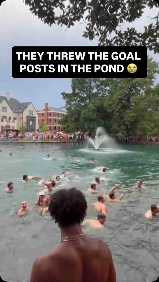 Oklahoma State students take the goal posts to Theta pond