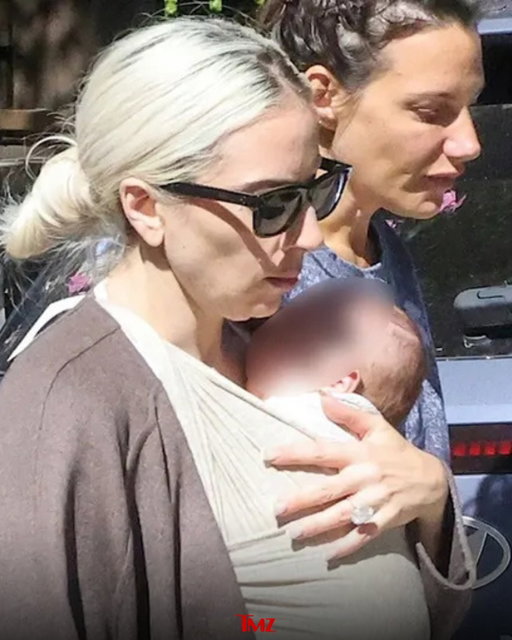 Lady Gaga was spotted recently holding her swaddled child close to her chest while walking with her fiancé, Michael Polansky, and a friend.

📸 @backgrid_usa