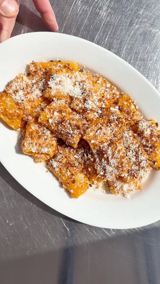 Spicy squash rigatoni with walnut breadcrumbs <3 The perfect Fall bite using the best ingredients from @officialfarmboy 

spicy squash sauce: 
Farm Boy™ Extra Virgin Olive Oil 
1 butternut squash, roasted + peeled 
3 shallots, sliced thin 
3 cloves garlic, peeled + crushed 
2 tbsp Farm Boy™ Tomato Paste 
1 tbsp Farm Boy™ Spicy Bomba (chillies in oil) 
3 tbsp unsalted butter 
salt + pepper to taste

walnut breadcrumbs:
1/2 cup Farm Boy™ Raw Walnut Pieces 
1 tsp Farm Boy™ Crushed Chilli Peppers
1 cup Farm Boy™ Panko Breadcrumbs 
salt + pepper to taste 

Chop the walnuts into evenly fine pieces and add to a pan with a glug of olive oil. Toast on medium/high until slightly darkened in colour and fragrant. Toss in the chilli flakes and toast for another minute before adding the breadcrumbs. Season with salt and pepper and toast until everything is dark toasty brown. Spread on a tray lined with paper towel to cool and absorb any excess oil. 

Roast the squash till fork tender then peel and add to a blender. Cook the shallots and garlic in a pan with a touch of olive oil, just till soft. Season with a pinch of salt then add the tomato paste and spicy chillies in oil. Cook for another minutes or two then spoon it into the blender along with the butter. Blend till smooth and adjust seasoning where necessary. 
Cook Farm Boy™ Paccheri Rigati till al dente (about 9-10 minutes) then add to a pan with a ladle of the pasta water. Pour in enough sauce to coat the pasta and toss till fully incorporated. 
Plate and top with the walnut breadcrumbs and fresh grated parm. 

#Ad #FarmBoyPartner #OfficialFarmBoy #AFarmBoyFreshTwist