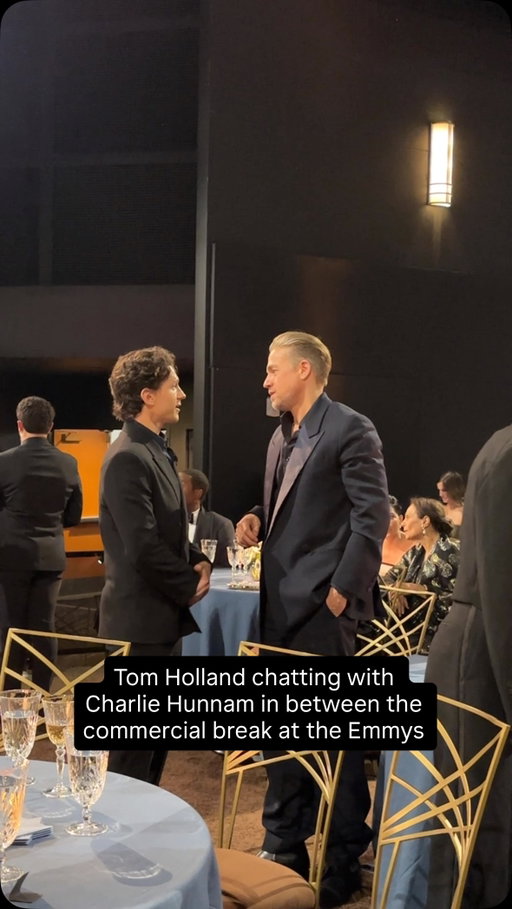 Tom Holland chatting with Charlie Hunnam in between the commercial break at the #Emmys
