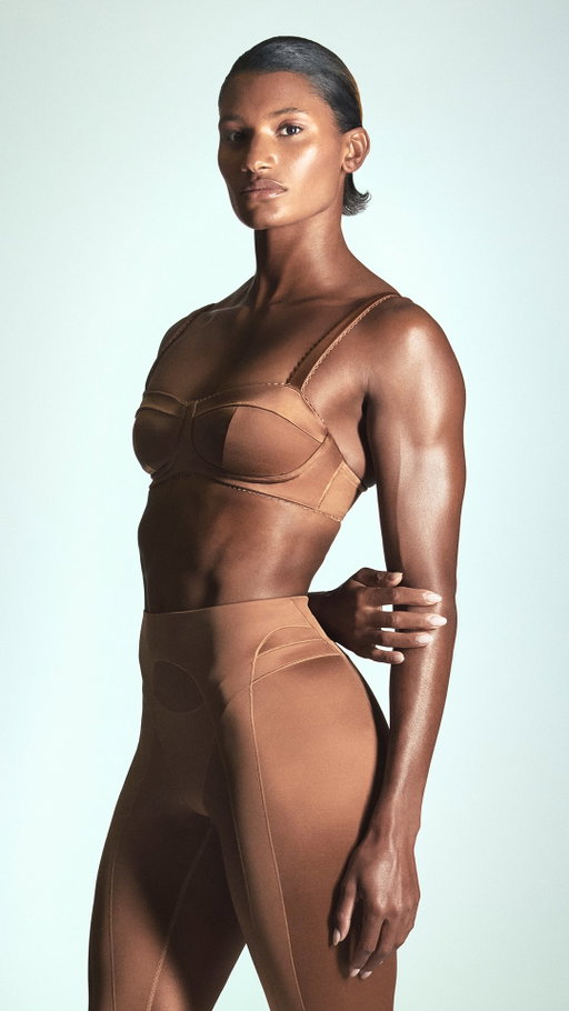 Strength is feminine. Fast is feminine. Defined is feminine. For Olympic Track & Field medalist @annacockrell, these have never been mutually exclusive.

New NikeSKIMS is arriving September 17.
