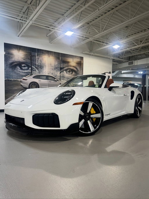 Another exceptional Turbo S delivered at Porsche Gold Coast.​

This 992.2 Porsche 911 Turbo S Cabriolet is a specification where performance, 
craftsmanship, and timeless Porsche design come together beautifully.​

Its stance is defined by 20-/21-inch Sport Classic center-lock wheels finished in 
High Gloss Black with highly polished faces—a design inspired by the iconic 
Fuchs-style wheel and first introduced on the 911 Sport Classic. Behind them, 
the standard Porsche Ceramic Composite Brake (PCCB) system adds its 
unmistakable Yellow calipers.​

And the performance is every bit as impressive as the specification. The new T-
Hybrid powertrain pairs a twin-turbo 3.6-liter flat-six with electric turbocharger 
technology to produce 701 hp, sending power through an 8-speed PDK and all-
wheel drive. The result? 0–60 mph in just 2.5 seconds.​

Inside, the attention to detail continues with 18-way heated and ventilated 
Adaptive Sport Seats Plus featuring 930-style quilting, full-leather seat 
consoles, and Paldao wood interior trim with silver accents. Matching leather 
and Paldao wood on the Sport Seat Plus backrests make the cabin especially 
distinctive.​

Debossed “turbo S” headrests, an embossed center console lid, leather-finished air 
vents and surrounds, leather sun visors, white Sport Chrono and tachometer 
dials, and the Burmester® High-End Surround Sound System complete a cabin 
where seemingly every detail has been considered.​

A huge congratulations from all of us at Porsche Gold Coast to our longtime client on his new 911 Turbo S Cabriolet. We wish you many happy and healthy miles behind the wheel. Enjoy every one of them.​
​

#Porsche #Porsche911 #911TurboS #PorscheTurboS #992TurboS #PorscheGoldCoast #PorscheMoment #PorscheExclusiveManufaktur #ThereIsNoSubstitute