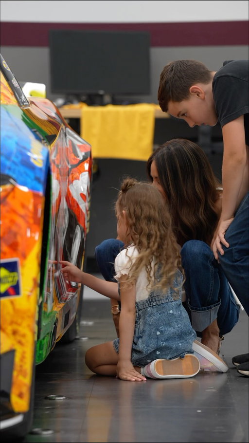 The M&M’S Kyle Busch tribute car is complete and ready for Bristol. Samantha, Brexton, and Lennix got a chance to see it first, and explore the many great photos featured within the design.