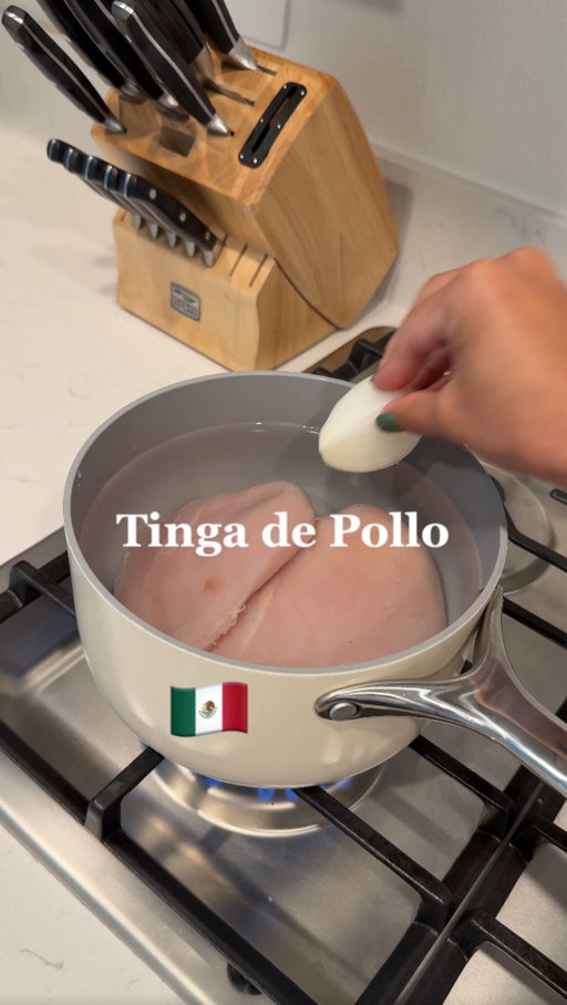 Tinga de Pollo receta 🇲🇽⬇️

For the chicken:
* 2 chicken breasts
* ½ onion
* Garlic cloves 
* Bay Leaf
* Chicken bouillon
For the tinga sauce:
* 4 tomatoes
* ½–1 onion
* Garlic cloves 
* Chipotle peppers in adobo
* Oregano 
* Cumin
* Black pepper
* Salt, to taste
* Chicken bouillon, to taste

For serving
* Tostadas
* Sour cream
* Shredded lettuce
* Avocado
* Optional: queso fresco, cilantro, or sliced onion

Directions

Boil the chicken with onion, garlic, bay leaf, and chicken bouillon until cooked. Shred and set aside.

Boil the tomatoes, onion, and garlic. Blend with chipotle in adobo, adobo sauce, and your Mexican seasonings.

Sauté some onion, add the shredded chicken, then pour in the blended sauce. Add more seasoning to taste, cover, and simmer for about 25 minutes.

For the tostadas, add sour cream, chicken tinga, lettuce, and avocado

#mexican #recetas #tingadepollo #comidamexicana #mexico @caraway @nutribullet @lacostenamx